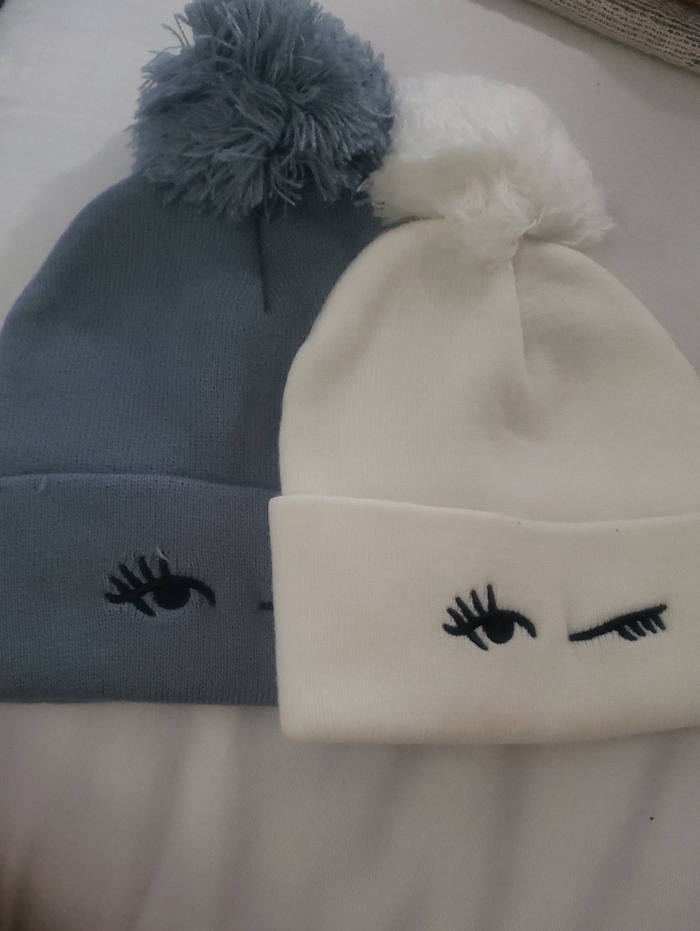 Wink Emoji Pom Beanies